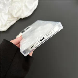 Square marble texture phone case detail, precision cutouts for iPhone protection, stylish design.