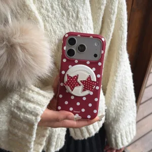 Red polka dot phone case detail view, cute star magnetic stand, soft texture close up view.