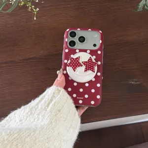 Red polka dot phone case with star holder compatible with iPhone, matte finish aesthetic cover.