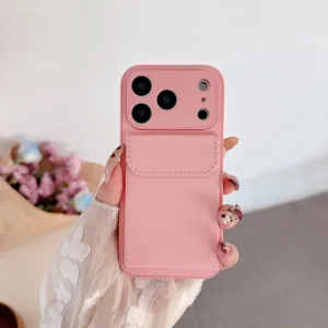 Pink leather phone case detail showing the back cardholder pocket and camera protection design.
