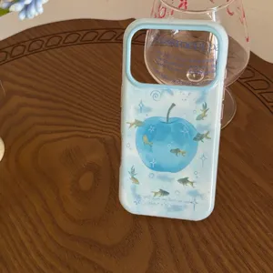 Detailed shot of the blue gradient phone case featuring a cute apple and goldfish art design.