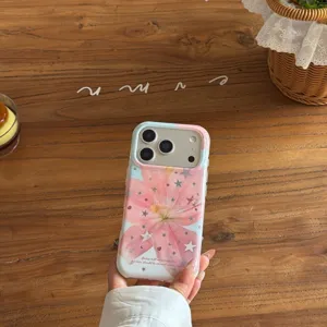 Pink lily flower glitter star phone case compatible with iPhone 15 16 pro max series detail shot.