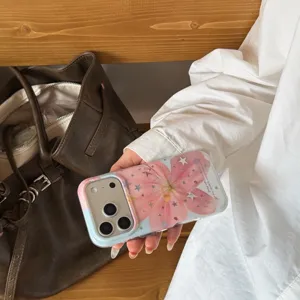 Transparent pink lily phone case with stars, stylish floral design for Apple iPhone series detail.