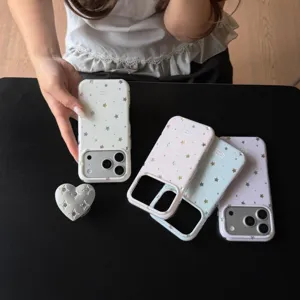 Detailed close-up view of ins-style starry pattern phone case with a matching heart holder.