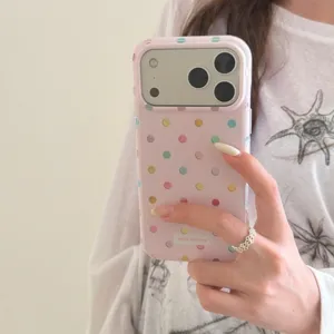 Detail view of the pink colorful polka dot phone case, showing exquisite craftsmanship.