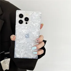 Square colorful shell pattern iPhone case detail showing pearlescent texture and precise cutouts.