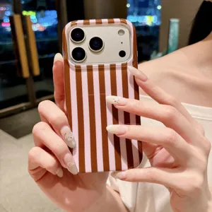 Brown pink vertical stripe phone case detail, stylish geometric design grip close up view