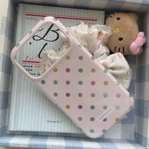 Pink polka dot phone case with double rounded edges, aesthetic phone accessories.