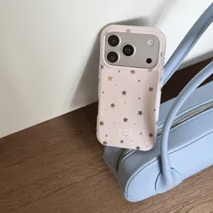 Detailed view of the cute pink phone case featuring holographic colorful stars and smooth edges.