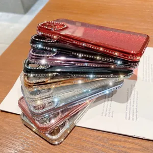 Funda de teléfono con diamantes de imitación de lujo y borde chapado para iPhone.