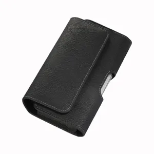 Detailed view of black leather waist phone holster, horizontal belt pouch with magnetic closure.