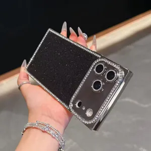 Square electroplated rhinestone glitter phone case detail showing sparkling camera frame.