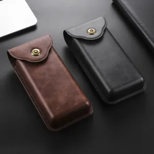 Close-up detail of premium leather folding phone case in brown and black with snap button closure.