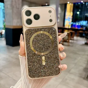 Luxury rhinestone magnetic phone case detail showcasing sparkly diamonds and metal ring stand.