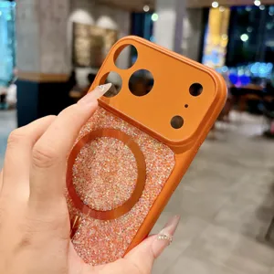 Detailed close-up shot of the sparkling rhinestone phone case with magnetic ring in vibrant orange.