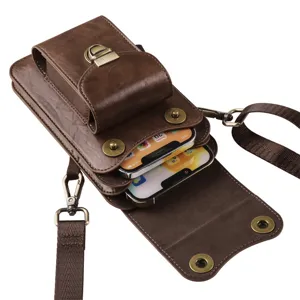 Brown leather vertical dual pocket phone holster detailed view with shoulder strap and metal clasp.