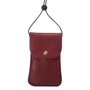 Detailed view of the dark red PU leather phone pouch featuring a secure snap button and cord strap.