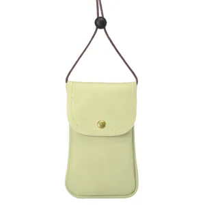 Light green mini crossbody phone pouch detail, featuring brown adjustable strap and snap button.