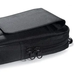 Close-up detail shot of black oxford cloth universal phone waist bag, double zipper design.