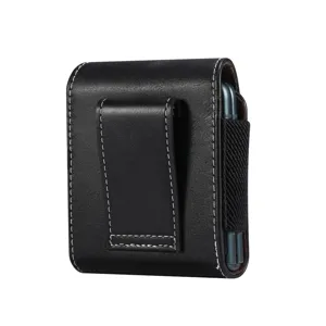 Closeup of black leather foldable phone holster with belt clip and white stitching.