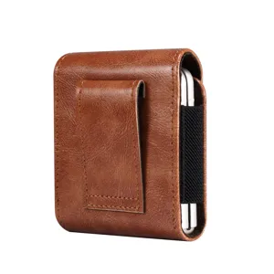 Detail view of brown leather folding phone holster pouch with belt clip and elastic side.