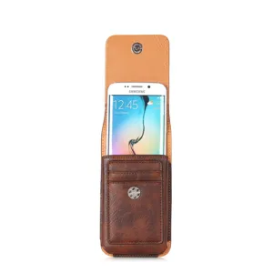 Detail view of brown leather belt holster pouch featuring card slots and secure magnetic snap button.