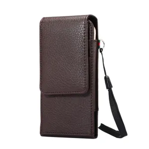 Dark brown leather phone holster detail showing litchi pattern texture and metal ring.