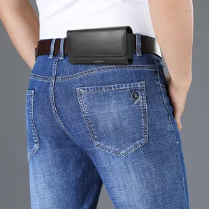 Black leather phone holster for belt wear, horizontal waist bag with magnetic closure.