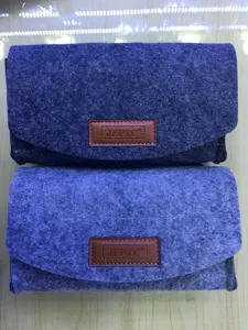 Grey felt phone storage bag clutch for women, classic design with leather label detail.