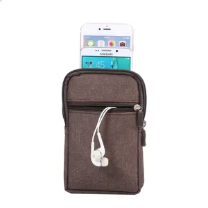 Universele 6,5 inch canvas heuptas met rits telefoon tasje en koptelefoon opening bruin