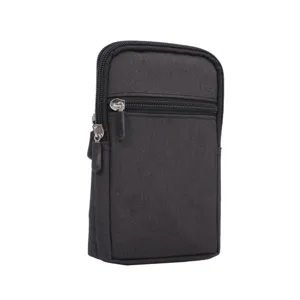 Detailopname van het zwarte canvas telefoontasje met rits, multifunctionele heuptas.