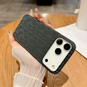 Detailed view of the magnetic hard PC phone case with fine dotted texture in hand.