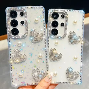 Sparkly rhinestone pearl phone case with shiny camera protection for stylish daily mobile use.