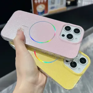Detailed close-up of glittering IMD dual-film phone cases with magnetic ring in pink and yellow.