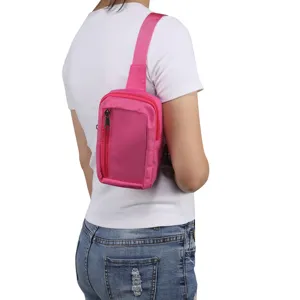 Pink nylon crossbody chest bag, lightweight casual shoulder bag detail showing strap.