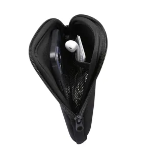 Close-up detail of black elastic zippered phone pouch with inner mesh pocket and phone.