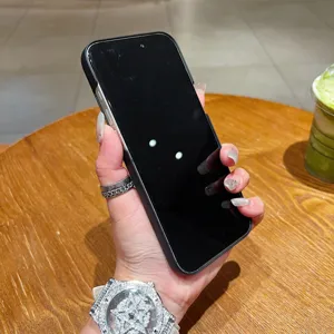 Detailed close-up of the ultra-thin magnetic phone case held in hand, showing sleek design.