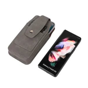 Detail view of the gray vertical leather phone holster with belt loop and card slots.