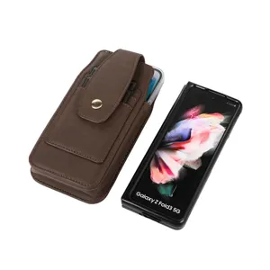 Brown vertical leather phone holster with card slots and belt loop for men, detailed view.