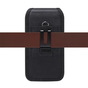 Detail view of black nylon phone belt pouch with metal clip and D-ring on brown belt.
