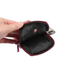 Deporte correr bolsa brazo movil detalle interior bolsillo cremallera agujero auricular.