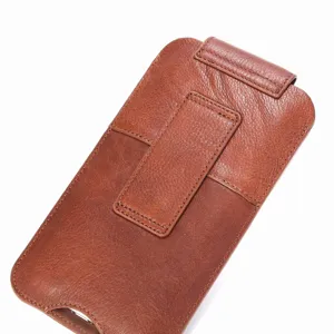 Detailed view of the brown genuine leather phone holster case featuring a sturdy belt clip.