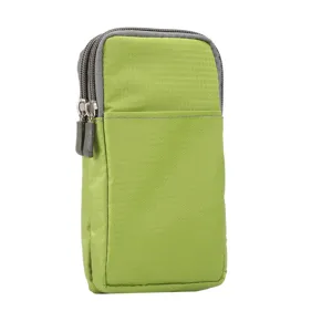 Close-up detail of green canvas phone pouch showing durable fabric and dual zipper compartments.