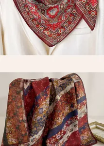 Close-up detail of vintage paisley and floral print square scarf, elegant fabric texture.