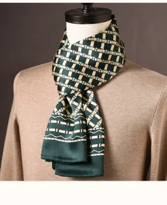 Men's silk scarf detail view, green geometric bamboo pattern, elegant business neckwear accessory.