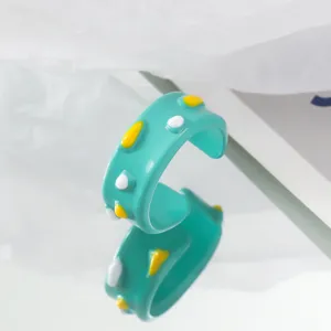 Cute mint green open ring with colorful spots, sweet playful design for women and girls.