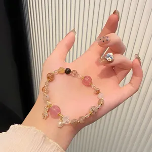 Crystal quartz beaded bracelet with cute bear pendant, sweet and stylish variant style.