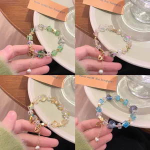 Charmant bracelet de perles de cristal avec pendentif cœur et perle pour femmes style.