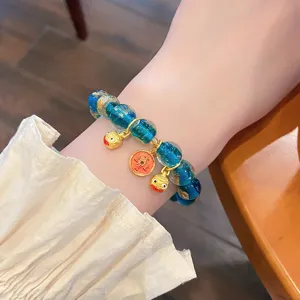 Bracciale in vetro blu con foglia d'oro e ciondoli, gioiello da polso in stile cinese.