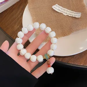 Bracciale con perline di vetro di loto, stile dolce e fresco, gioiello artigianale.